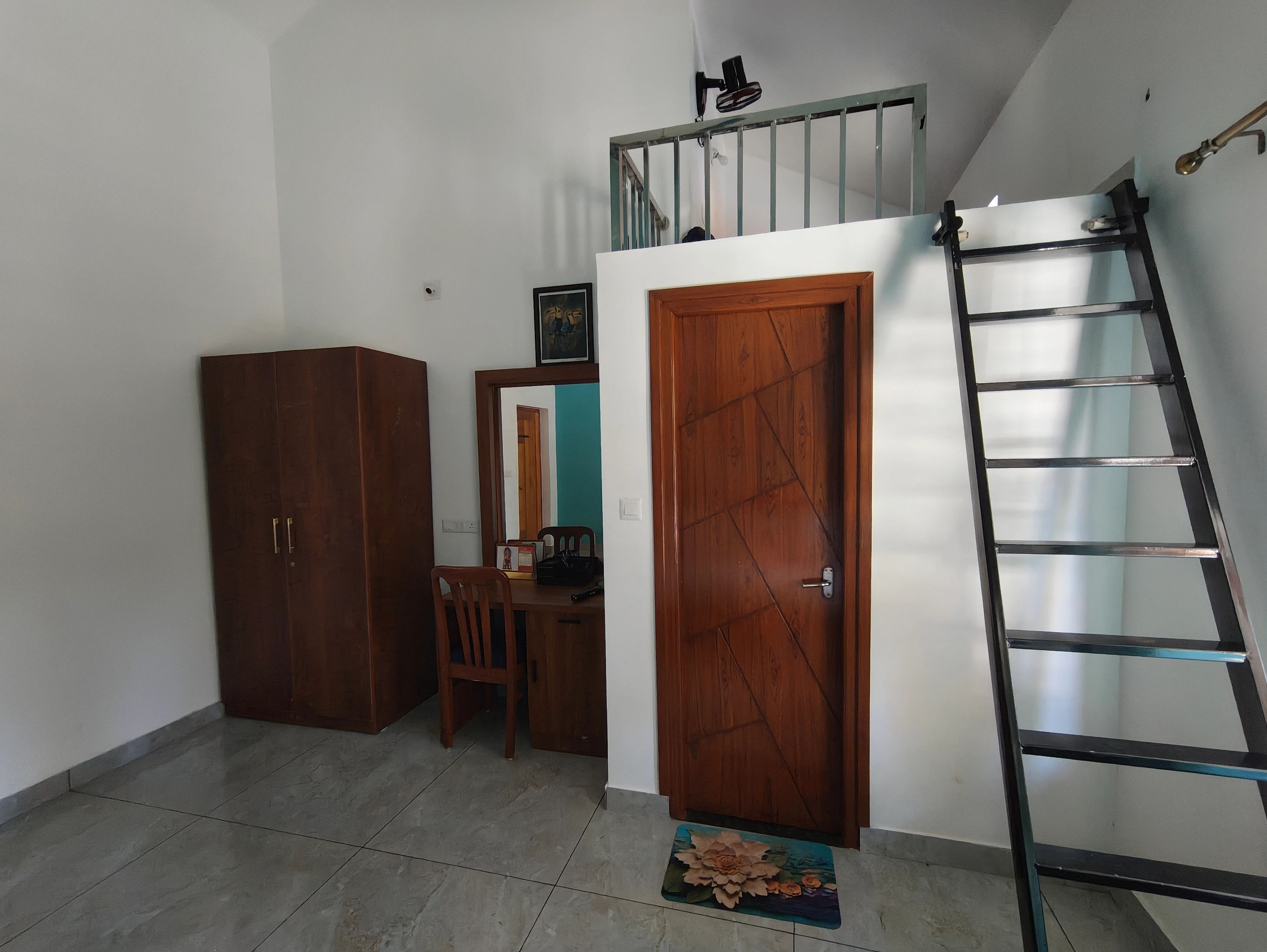 Room with Wardrobe and Ladder to Mezzanine Loft