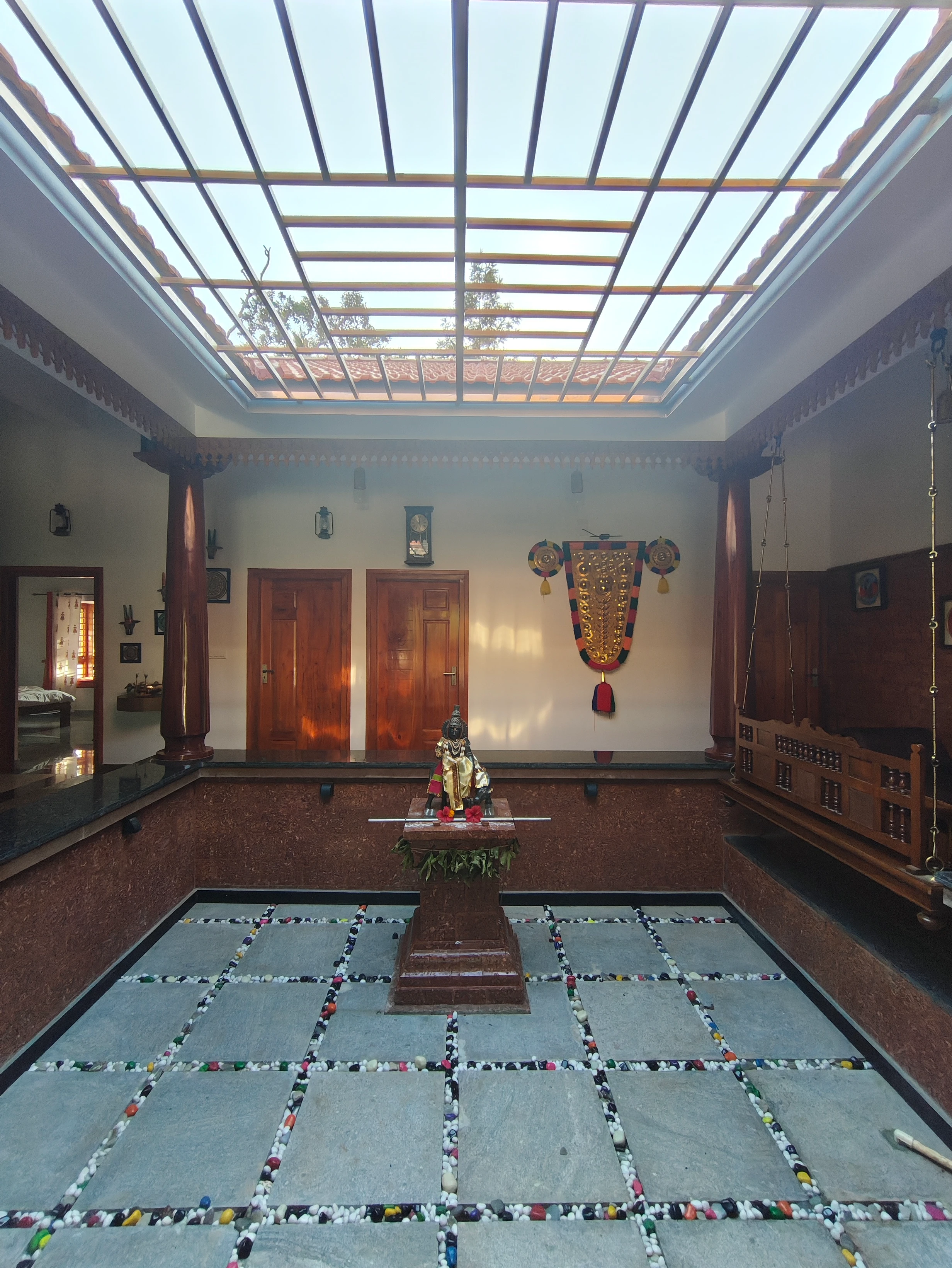 Traditional Central Interior Courtyard with Wooden Swing